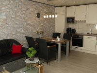 Wohnung  Wohn und Essbereich mit Küchenzeile